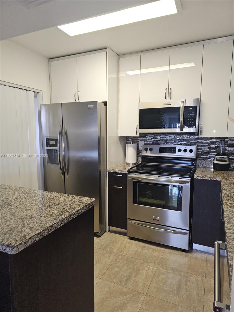 QUATRAINE CONDO IV - Residential