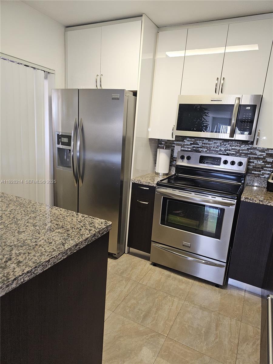 QUATRAINE CONDO IV - Residential