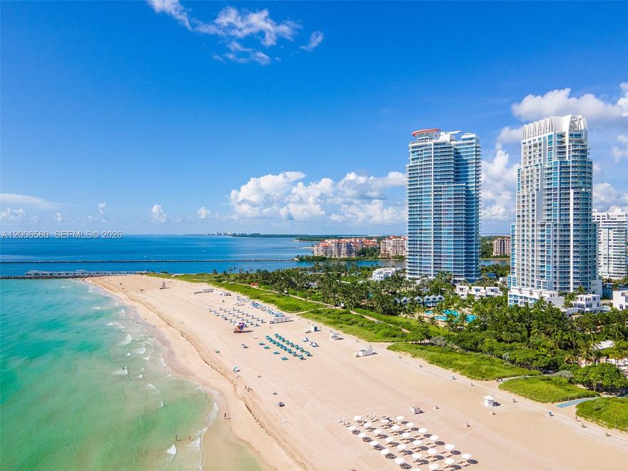 Experience the pinnacle of South of Fifth living in this grand 3,497-square-foot corner residence showcasing impressive double living room salons and oversized oceanfront dining room. Designed for those who demand both privacy and prestige, this direct oceanfront sanctuary boasts an expansive, open-concept layout framed by floor-to-ceiling glass walls and vistas of the Atlantic, and the entire island of Miami Beach. Arrive through your private elevator foyer to discover a meticulously furnished home wherefore generous balconies serve as your personal observation deck for Miami’s best sunrises. Lavish oversized primary suite with upgraded baths and double wide terrace evokes serenity. Beyond your private residence, the Continuum is the only private enclave that delivers an exclusive 12.5-acre oceanfront oasis. Enjoy effortless living with elite amenities, including beach club service, a world-class multi-level fitness and wellness center, including rooftop fitness pool, rooftop turf gym, Pilates, spinning, boxing, yoga, IV Therapy, dual full-service spas with cold plundges and indoor Jacuzzis, massage therapy and beauty salon services. 3 har-tru tennis courts and pro-shop, a private Italian restaurant "Patio", serving residents beachside, poolside or at their residence. All managed by a white golve dedicated, full-time concierge. Complete with four private parking spaces and seamless valet, this is more than a residence; it is the definitive Miami Beach address.