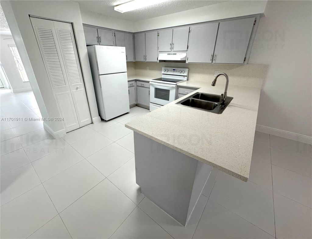 Photo of 4300 NW 110th Ave #N, Coral Springs, FL 33065 (MLS # A11701911)