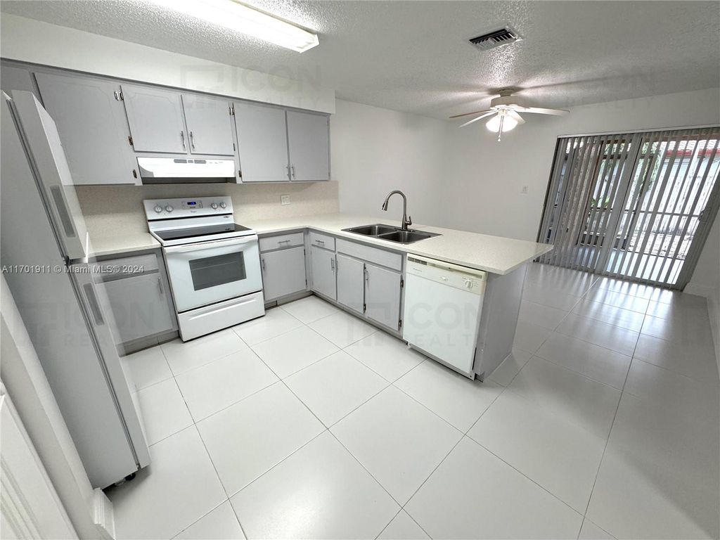 Photo of 4300 NW 110th Ave #N, Coral Springs, FL 33065 (MLS # A11701911)