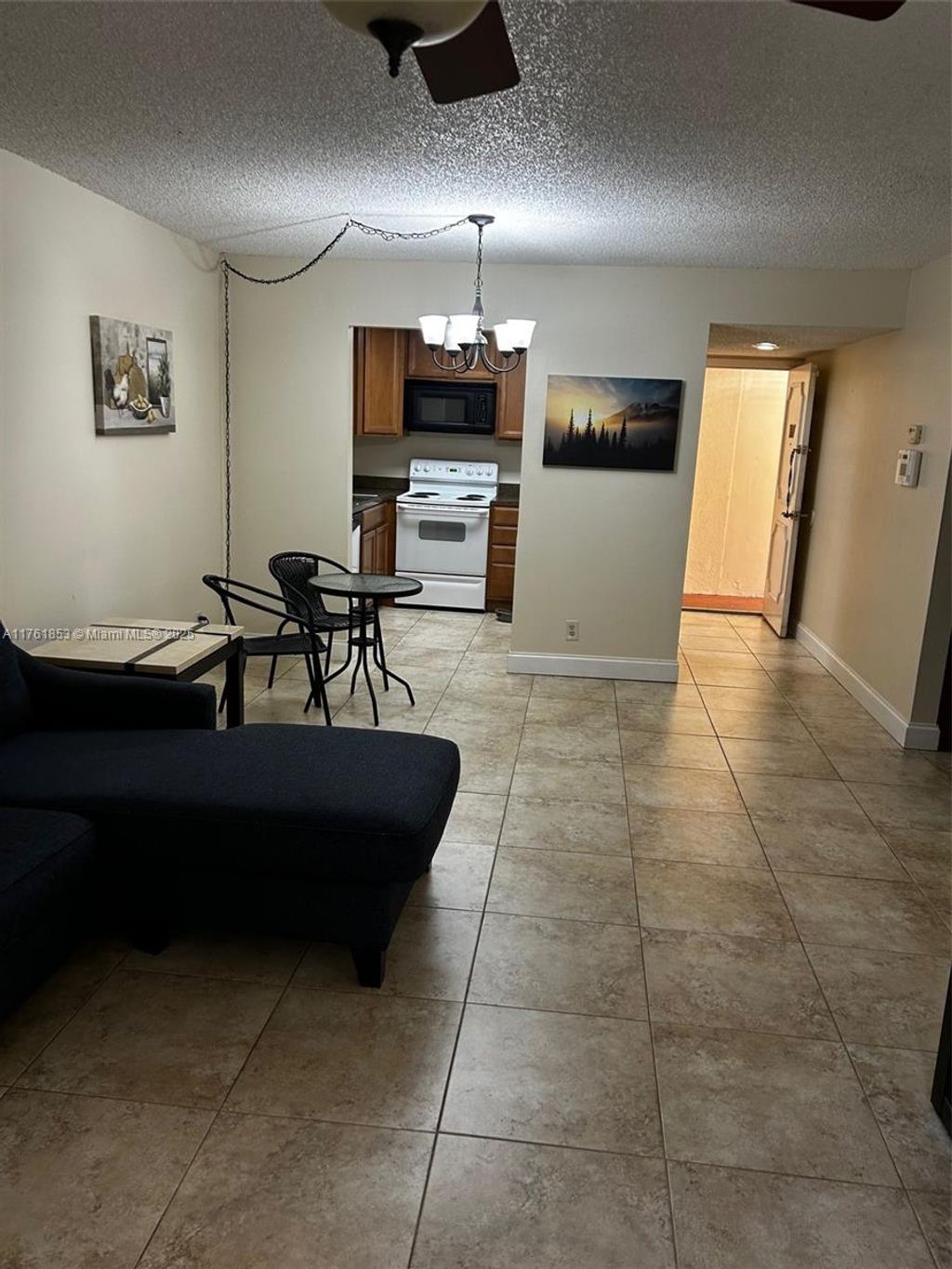 Photo of 4124 NW 88th Ave #107, Coral Springs, FL 33065 (MLS # A11761853)