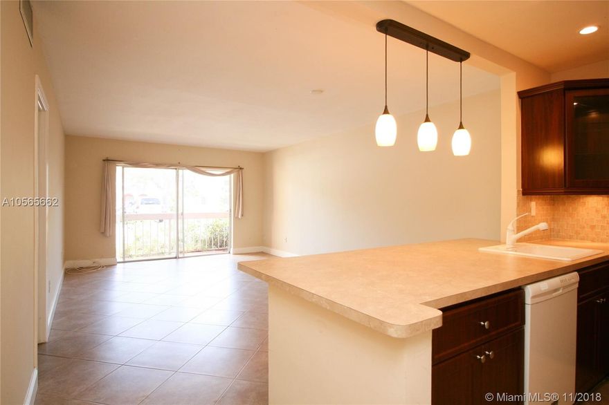 Nicely Updated 1/1 in the very well maintained & ideally located community of Village of Kings Creek! 
Features an Open & Updated Kitchen, is freshly painted, tile floors throughout, updated bathroom, linen and additional storage closet, new lighting, spacious balcony. Master bedroom features a walk-in closet & 2nd reach in closet. Community amenities include 4 community pools, one of which is steps from your building, basketball, tennis, & racquetball courts, & gym, 24 Hr. roving security, plenty of parking for residents and guest. Hurricane Impact windows and sliding glass door to be installed soon!! Easy to see!