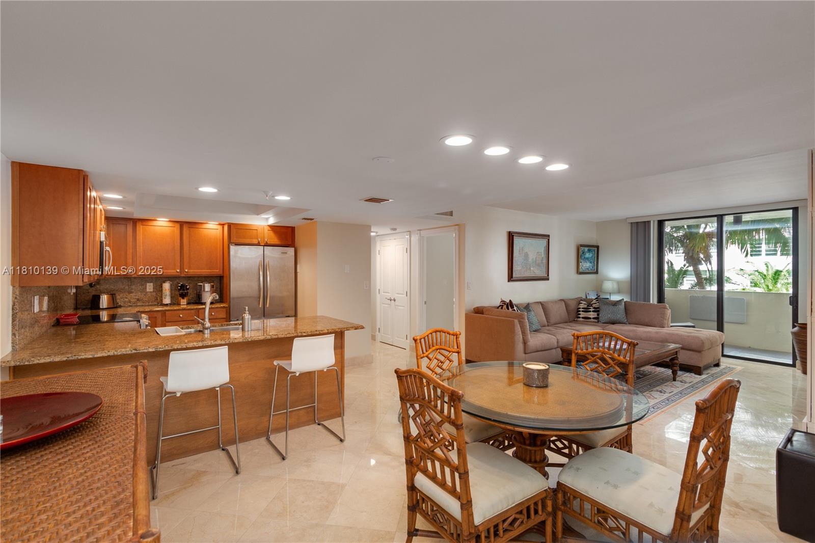 Welcome to your beachside home! This updated 2-bed, 2-bath plus den condo offers ocean views, elegant marble floors, and an open kitchen with granite countertops and stainless steel appliances. The enclosed den is perfect for a home office or cozy retreat, and the primary suite features a whirlpool tub. Located at The Georgian in South Beach, just a short walk to Lincoln Road and Ocean Drive. Amenities include 24-hour security, a gym, heated pool, beach service, and more.