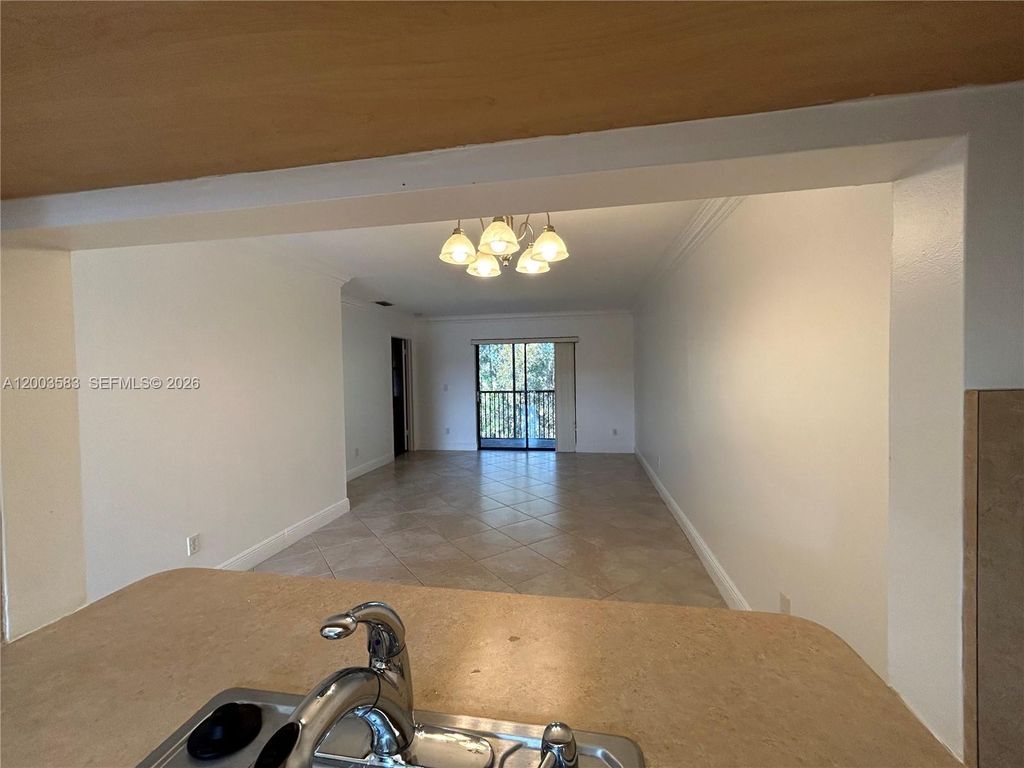 Photo of 10613 NW 11th St #205, Pembroke Pines, FL 33026 (MLS # A12003583)