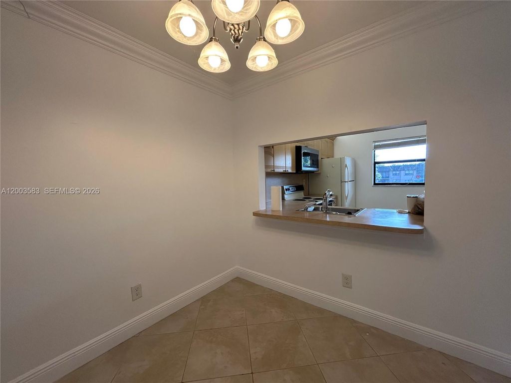 Photo of 10613 NW 11th St #205, Pembroke Pines, FL 33026 (MLS # A12003583)