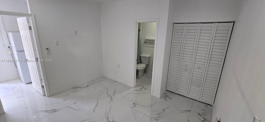 Recently updated efficiency in Homestead now available!  Unit features, a mini living area, a bedroom with a spacious closet and bathroom, porcelain tile throughout, kitchen space with a refrigerator, sink and an electric cook top with 2 burners. *** Please note efficiency does not come with a microwave, the couch, the table with 2 chairs or the cabinet stand next to the refrigerator (as shown in the pictures) ***