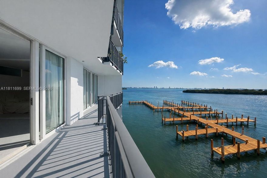 Fully renovated condo converted into a 1 bedroom, 2 bath + den, with 1,042 square feet of bright, modern living space. Every detail has been updated, from the sleek kitchen featuring high-end appliances and custom cabinetry to the contemporary bathrooms with luxurious fixtures. New lighting, flooring, and finishes create a seamless, sophisticated design throughout. Enjoy stunning Biscayne Bay and skyline views from your private balcony in this waterfront community. The spacious primary suite includes ample closet space and an en-suite bath. Washer & dryer in unit. Amenities include a waterfront pool, tennis & pickleball courts, fitness center, BBQ area, and 24/7 security. Ideally located near shopping, dining, and all that Miami has to offer.