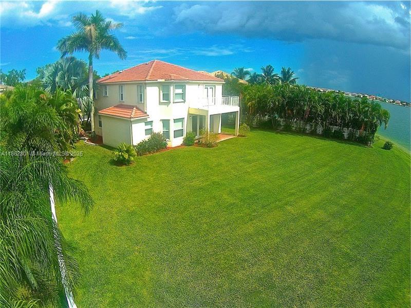 Your dream home awaits! Ideal for a medium family, this property offers an incredible lake view. Situated on a spacious lot with a beautiful and expansive backyard garden, the home stands out for its comfort and generous layout. Featuring two levels, it includes 4 bedrooms, the primary bedroom has access to the fourth room, which can be used as an office, TV room, or additional bedroom. The home also offers 2 full bathrooms upstairs and a half bathroom on the main floor. The community provides excellent amenities such as sports courts, a playground, a clubhouse for meetings/parties, and more. Lawn maintenance is included in the rental price.