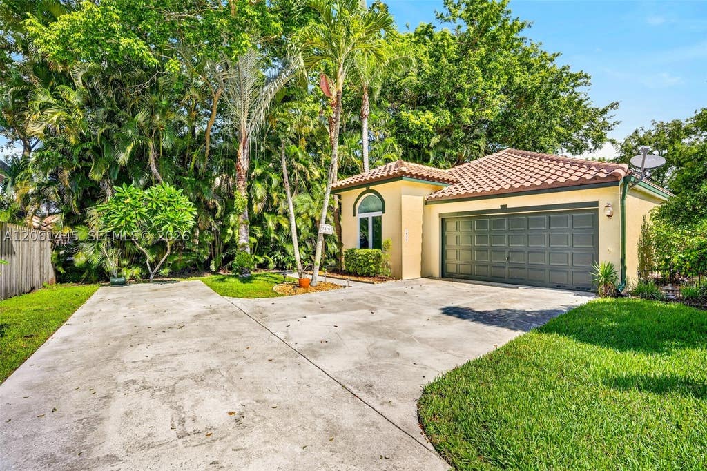 Photo of 1419 Banyan Cir, Pompano Beach, FL 33069 (MLS # A12061445)