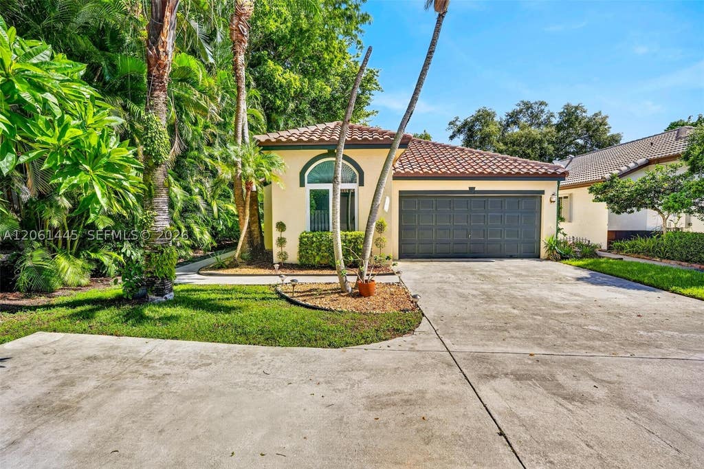 Photo of 1419 Banyan Cir, Pompano Beach, FL 33069 (MLS # A12061445)