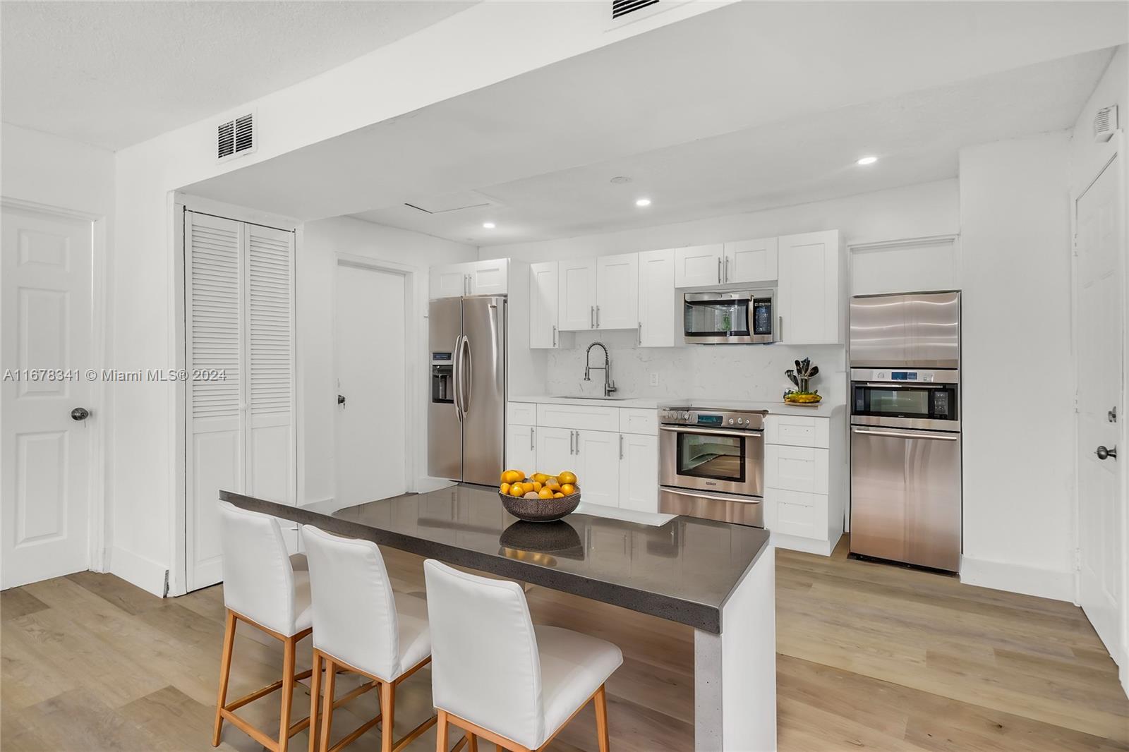 This beautifully renovated 3-bedroom residence is perfectly situated in the vibrant heart of Miami, offering both comfort and style. Sparkling Kitchen, Vinyl Flooring throughout, and Updated Bathrooms. Plenty of backyard space and centrally located in the heart of Miami! Close to Wynwood, Miami International Airport, Downtown, Little Havana, and easy access to I-95. Come see this beauty today before its gone!