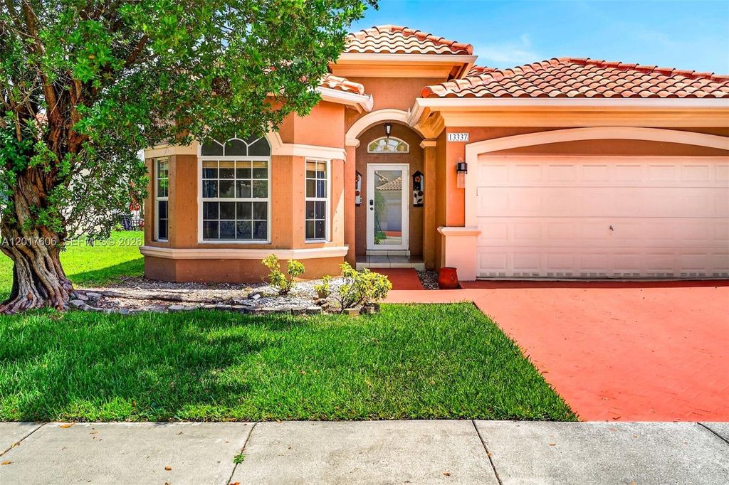 Photo of 13337 SW 52nd St, Miramar, FL 33027 (MLS # A12017606)