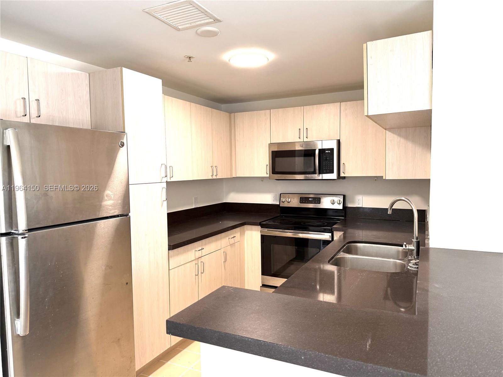 185 SE 14th Ter 1807