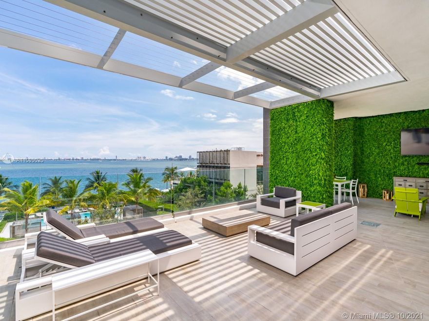 Stunning Ultra-Contemporary Bay Home Townhouse combining single-family living with resort style amenities. This 4-story Bay Home features top of the line appliances with luxury finishes, floor-to-ceiling windows, an interior private elevator, beautiful porcelain floors throughout, scenic bay views from every room, fitness/media room, a spectacular rooftop terrace overlooking the bay, and more.  Enjoy the best amenities in Miami, including a 100 ft diameter pool, state of the art gym, spa, sauna, steam room, private screening room, wine cellar and tasting salon, cigar lounge, outdoor grill, game room with multimedia facilities, bowling alley, tennis courts, and Bayfront Beach club with famed AMARA Restaurant by Award-winning Chef Michael Swchartz. New Whole Foods coming just blocks away.