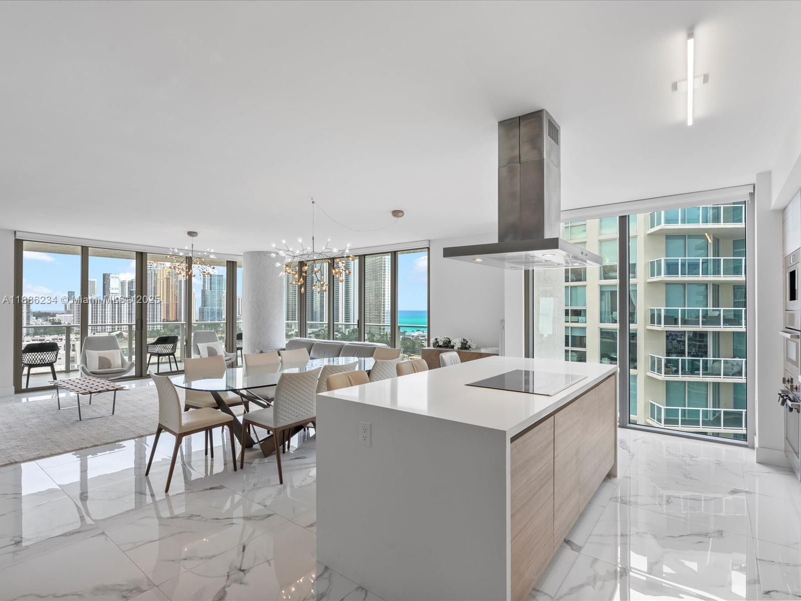 Step into luxury with this 1,892 sqft turnkey 3BD/3.5BA corner residence in Sunny Isles Beach, featuring a wrap-around balcony with panoramic ocean, Intracoastal, and skyline views. Fully furnished and upgraded, this light-filled home offers 10-ft ceilings, floor-to-ceiling impact glass, high-end European appliances, custom window treatments, designer lighting, beautfiul furniture, and a luxurious primary suite with a walk-in closet and soaking tub. Enjoy world-class amenities including infinity and lap pools, kids splash zone, kids playroom, state of the art fitness center, movie theater, game lounge, and much more. Includes storage, 2 assigned parking spaces, with an option for valet. Prime location just steps from the beach, park, dining, shopping and places of worship.