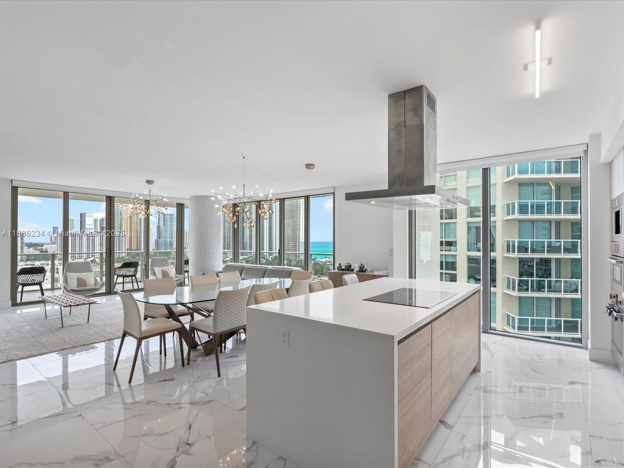 Step into luxury with this 1,892 sqft turnkey 3BD/3.5BA corner residence in Sunny Isles Beach, featuring a wrap-around balcony with panoramic ocean, Intracoastal, and skyline views. Fully furnished and upgraded, this light-filled home offers 10-ft ceilings, floor-to-ceiling impact glass, high-end European appliances, custom window treatments, designer lighting, beautfiul furniture, and a luxurious primary suite with a walk-in closet and soaking tub. Enjoy world-class amenities including infinity and lap pools, kids splash zone, kids playroom, state of the art fitness center, movie theater, game lounge, and much more. Includes storage, 2 assigned parking spaces, with an option for valet. Prime location just steps from the beach, park, dining, shopping and places of worship.