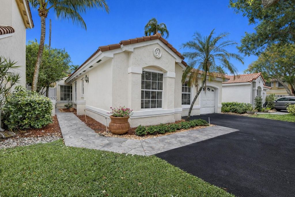 Photo of 922 Opal Ter, Weston, FL 33326 (MLS # A11991484)