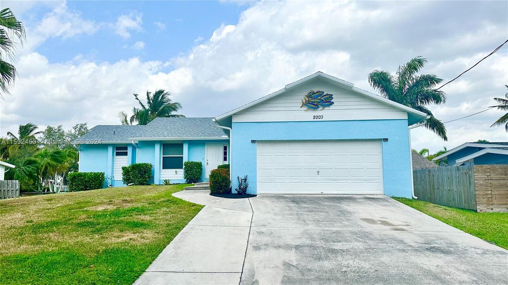 Photo of 2003 SW Mockingbird Ln, Palm City, FL 34990 (MLS # A11592460)