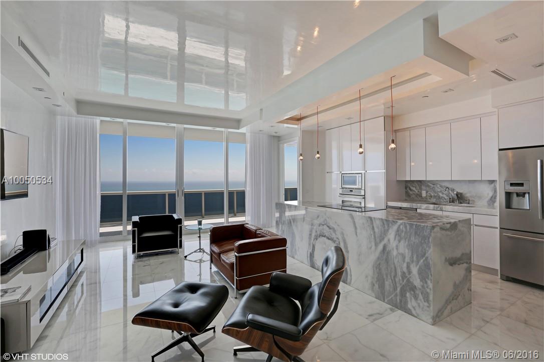 One Of A Kind Penthouse W/Breathtaking Direct Ocean Views. Completely & Exquisitely Renovated. 1,560 Sq.Ft Of Living Space That Opens Up To a Large Terrace Overlooking The Ocean.  Large 2 Bed/2 Baths +Den That Was Converted Into a 3rd Bed. 2 Assigned Pking Spaces & A Storage Bin Are Included . Some Of The Features Are: High Ceilings, Private Huge Terrace, 24 * 24  Carrara Marble Throughout & Inlays in Showers, State Of The Art Lighting & LED lighting in Bathrooms & Bedrooms.Ceilings, 2 Accents Walls