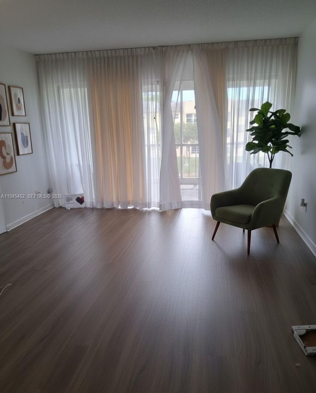 Photo of 5841 NW 61st Ave #304, Tamarac, FL 33319 (MLS # A11945462)