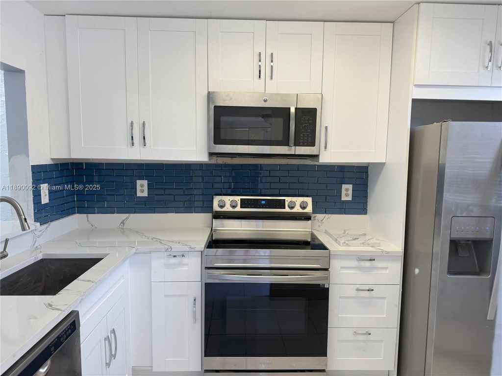 Photo of 9539 Boca Cove Cir #105, Boca Raton, FL 33428 (MLS # A11890092)