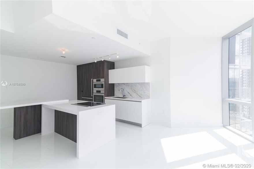 Welcome to the brightest and spacious 1 Bedroom + Den. A private elevator and welcoming foyer leads the way into a beautifully designed unit with luxurious finishes. Enjoy exclusive access to 46 different amenities that include basketball court, 5 pools, spa, outdoor lounge, boxing, state of the art fitness center, bbq's, demo kitchen, observatory, racquetball, yoga, sky deck, sunrise pool and more. The unit features a spacious floor plan with huge den, white porcelain tile, Bosch appliances, full washer/dryer, spacious full bathrooms with separate shower and tub and more.