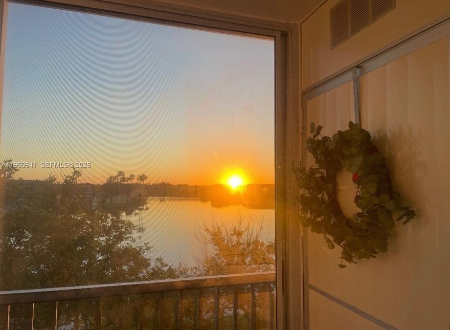 JUST REDUCED! BEAUTIFUL Waterfront 2/2 APARTMENT on 3RD floor. Complete remodel encompassing a new kitchen & bathrooms, an enclosed balcony.