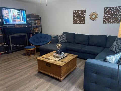 Photo of 1401 SW 134th Way #305C, Pembroke Pines, FL 33027 (MLS # A11960941)