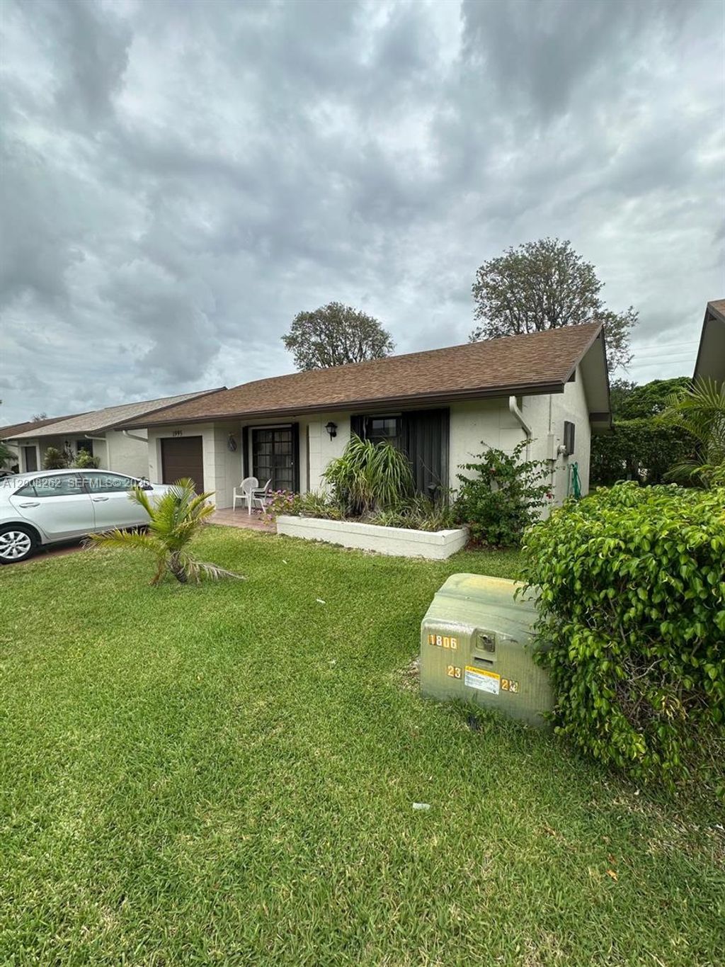 Photo of 1995 SW 15th Pl, Deerfield Beach, FL 33442 (MLS # A12008262)