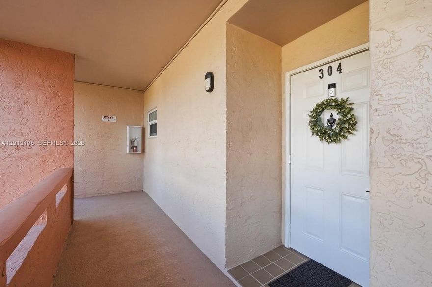 Bright and beautifully updated 1 bed, 1.5 bath unit with serene garden/lake views. Features include a renovated kitchen with stainless steel appliances, two pantries, updated primary bath with new privacy window, and spacious bedroom with walk-in closet. Real hardwood floors throughout with tile in wet areas. Enclosed patio/lanai for year-round use. Hurricane impact windows and brand new A/C (2026). Additional storage room included. Located in a well-maintained Tamarac community with low HOA of $485/month (includes Cable & Internet). Centrally located near highways, shopping, and restaurants. 55+ community; at least one occupant must be 55+. Motivated seller. Furniture negotiable and available. No rentals allowed.