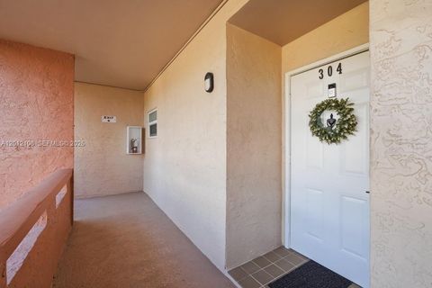 Photo of 8826 W Mcnab Rd #304, Tamarac, FL 33321 (MLS # A12012108)