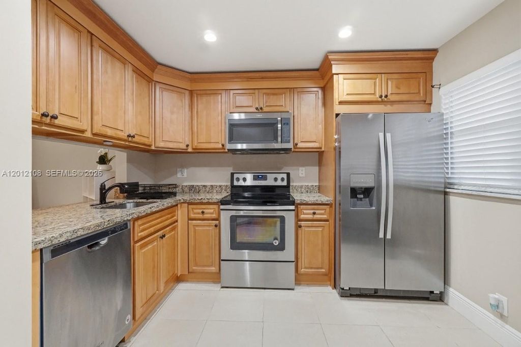 Photo of 8826 W Mcnab Rd #304, Tamarac, FL 33321 (MLS # A12012108)