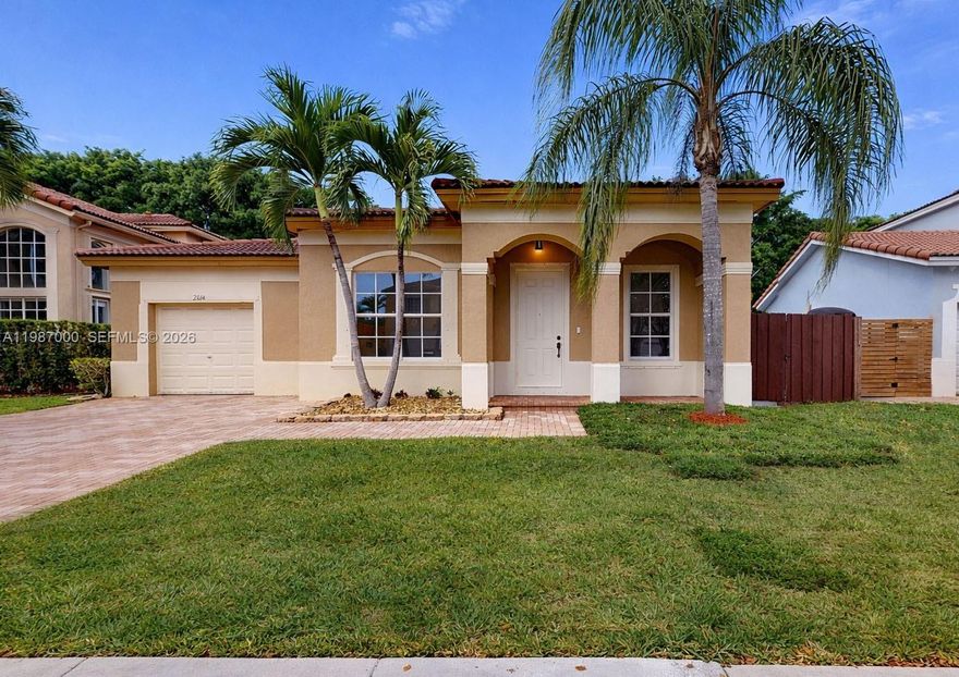 Beautiful 3BD/2BA Mediterranean-style home located in the sought-after, guard-gated community of Floridian Bay Estates in Waterstone. This charming single-story residence boasts a spacious front porch, a private fenced yard, and a driveway that accommodates two cars, plus a one car garage. Inside, you'll find tile floors throughout, a large kitchen with stainless steel appliances, new stylish window shades, and generously sized bedrooms. Enjoy resort-style living with access to the community’s luxurious amenities, including a clubhouse, three pools, a hot tub, gym, playground, lakes, and scenic jogging paths. Conveniently located near the Turnpike, major Shopping Centers, Homestead Baptist Hospital, Homestead Military Base, Biscayne National Park, Florida Keys, and renowned Waterstone Charter School.