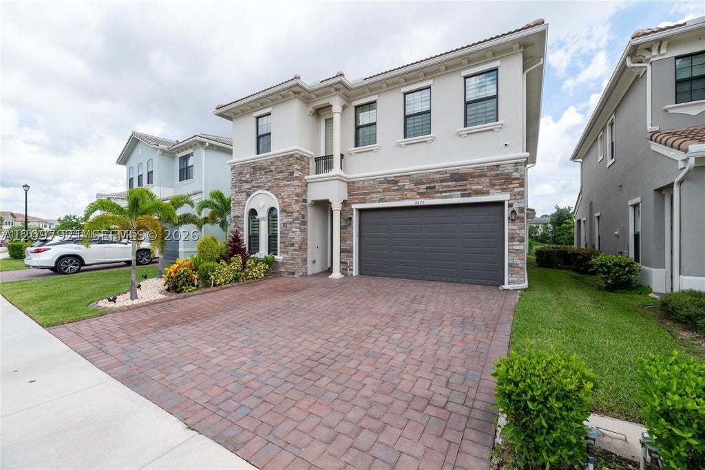 Photo of 8475 NW 39th Ct, Coral Springs, FL 33065 (MLS # A12097921)