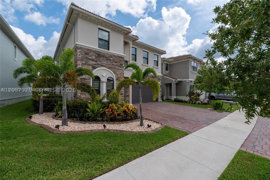 Photo of 8475 NW 39th Ct, Coral Springs, FL 33065 (MLS # A12097921)