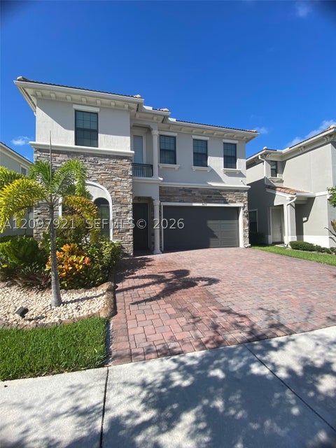 Photo of 8475 NW 39th Ct, Coral Springs, FL 33065 (MLS # A12097921)