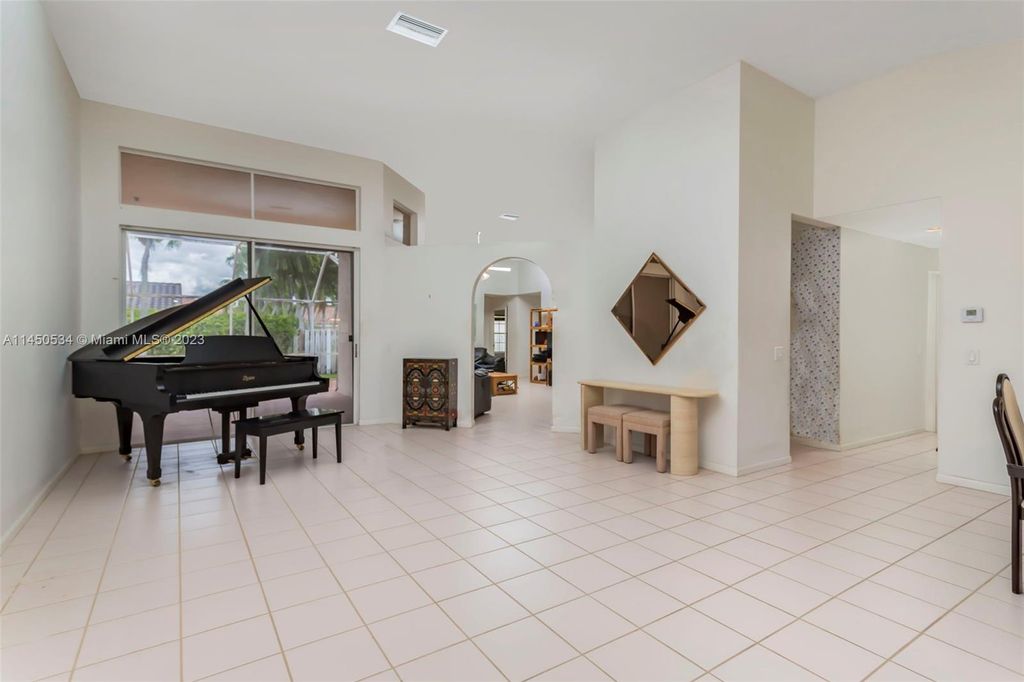 Photo of 668 Lake Blvd, Weston, FL 33326 (MLS # A11450534)