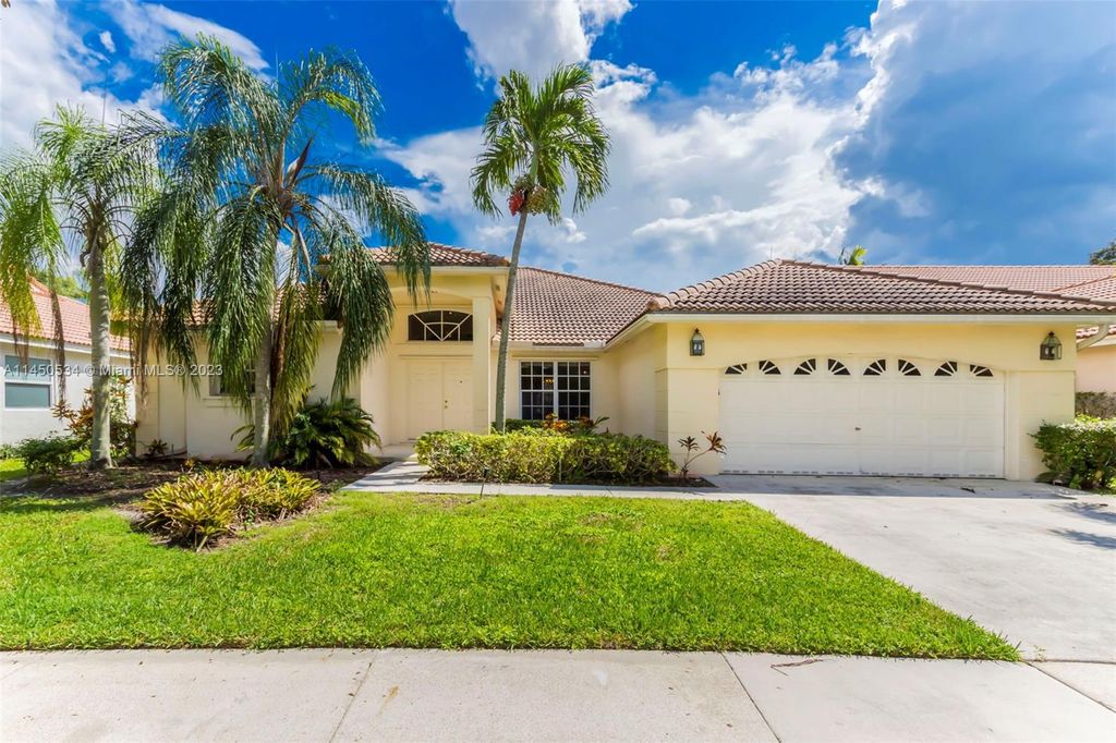 Photo of 668 Lake Blvd, Weston, FL 33326 (MLS # A11450534)