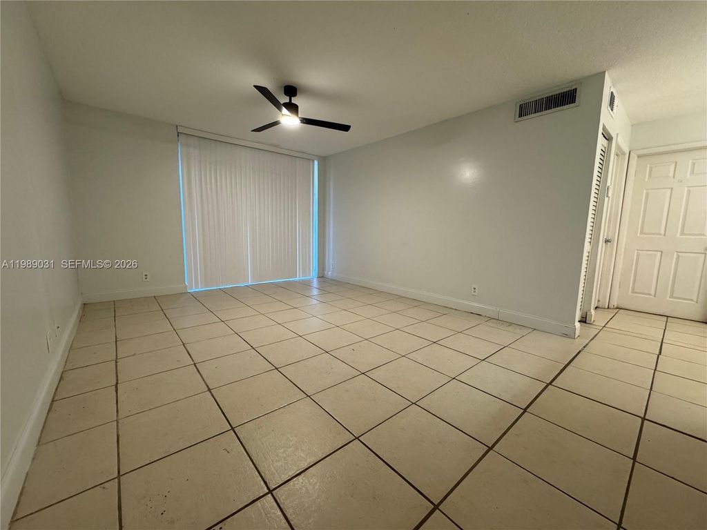 Photo of 10717 Cleary Blvd #107, Plantation, FL 33324 (MLS # A11989031)