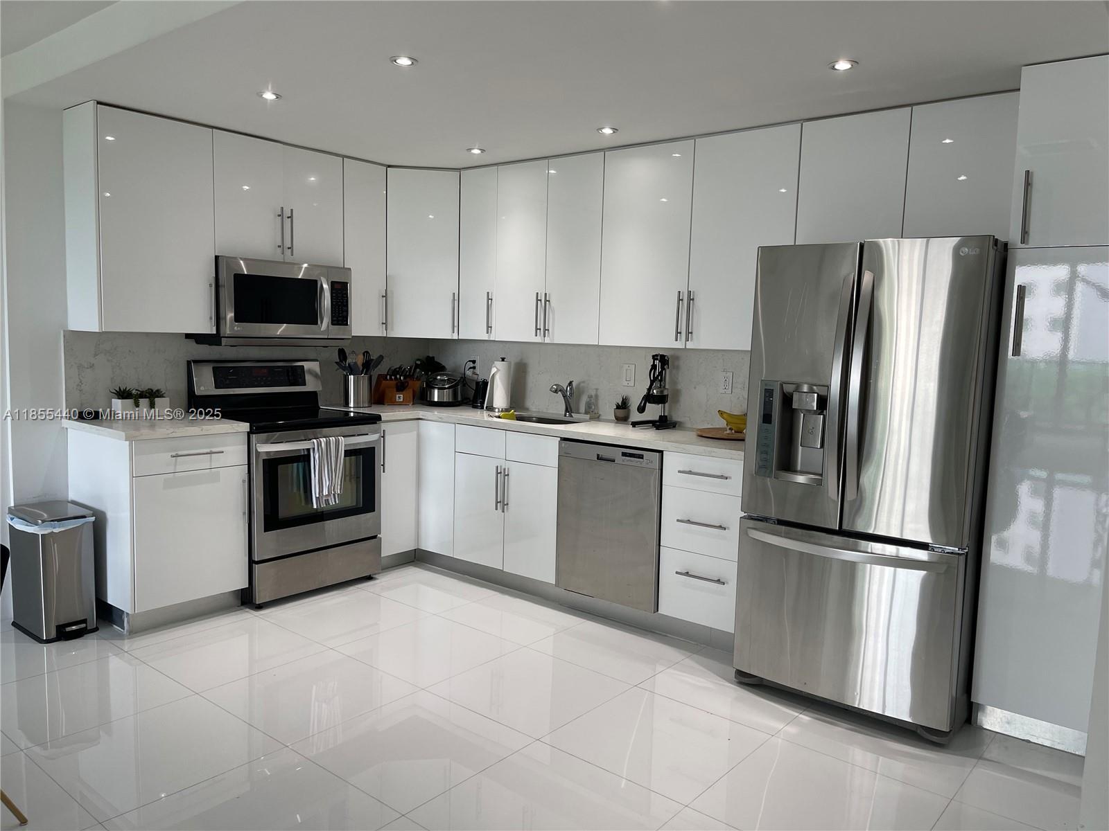 Stunning 2-bed, 2-bath fully remodeled condo with Washer/Dryer inside the unit. Located in a building undergoing a complete transformation, just steps from the beach. Prime location, quick access to Aventura Mall, shopping, dining, grocery stores, and city shuttle bus. Don’t miss this incredible opportunity to rent a spacious condo in desirable Sunny Isles Beach. This beautifully updated unit features an open kitchen, with stainless-steel appliances, along with elegant porcelain flooring. The oversized master bedroom & updated bathrooms add comfort, while the large dining & living room area is perfect for entertaining. Enjoy full amenities, including a doorman, community pool, fitness center, Bbq area, Tennis Court & on-site café. 1 assigned parking spaces
