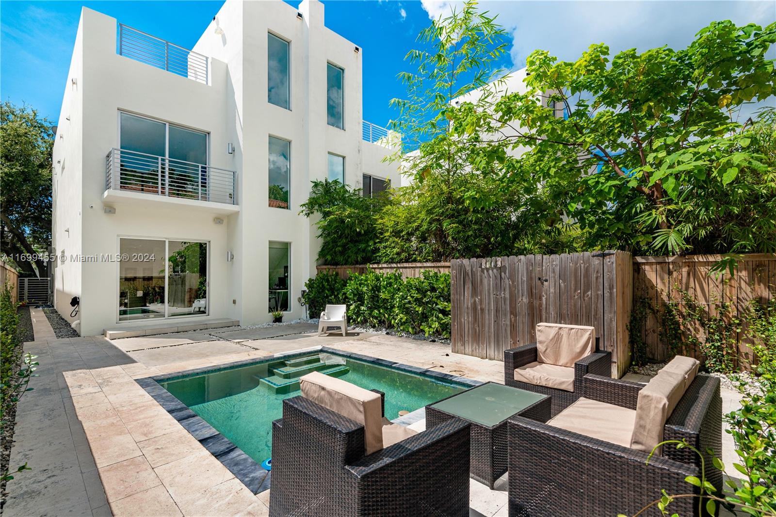Welcome to the best value in all of Coconut Grove for a Modern newer construction 2014 3bed/3bath Townhouse with a private pool, huge backyard and 1200 sq ft terrace. Features include: Coconut Grove Elementary school district, high ceilings, spacious living space, Mia Cucina kitchen with Jenn-Air stainless steal appliances, white tile floors downstairs & modern wood porcelain tile upstairs, super lux finished bathrooms, office space under the staircase, custom upgraded closets, electric blinds in all bedrooms, full 1 car garage, electric gate, spacious master bedroom w/spa like bathroom, 2 other bedrooms w/ample closet space & much more. This townhouse has a feel of a house. Walk to Cocowalk, shops, restaurants, parks and the marina. Very well maintained Townhouse with high end finishes.