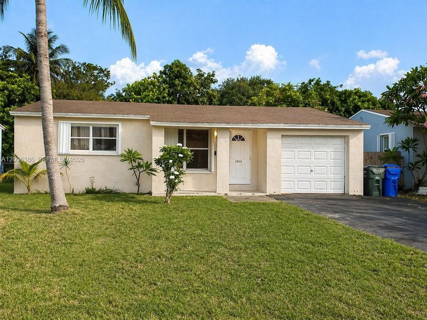 HOUSE WITH GARAGE AND PATIO. Welcome to a place where lifestyle, comfort, and convenience come together effortlessly. This beautiful home is perfectly designed for small families with a strong sense of quality living and the desire to create lasting memories. Imagine starting your mornings just 10 minutes from the beach. Located only 10 minutes from Fort Lauderdale Airport, And with Downtown Hollywood just 5 minutes away, you’ll enjoy charming restaurants, boutique shopping, and vibrant community life at your doorstep. 
This home is nestled in a safe, and family-friendly neighborhood, surrounded by excellent schools. The property features a spacious, oversized backyard—perfect for family gatherings, weekend barbecues, or simply giving your children room to play and grow. A covered garage adds both convenience. Within minutes, you’ll find a regional hospital, as well as public golf and pickleball court. This is more than just a home—it’s a place where your family can thrive, feel secure, and truly enjoy the best of South Florida living.
