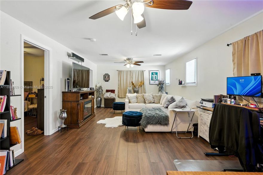 Welcome to this spacious, well-maintained 2-bedroom, 1-bath home with an additional flex space room that can easily serve as a home office, creative studio, or whatever suits your lifestyle. This residence combines comfort, convenience, and character all in one, nestled in the heart of a quiet West Palm Beach neighborhood. Step inside to an open and bright living area filled with natural light—ideal for relaxing or entertaining. The spacious kitchen offers ample cabinetry and counter space, while the updated flooring, energy-efficient windows, and fresh neutral paint create a modern, airy ambiance. Close to Publix, shopping centers, dining, nightlife, and major highways for an effortless commute.