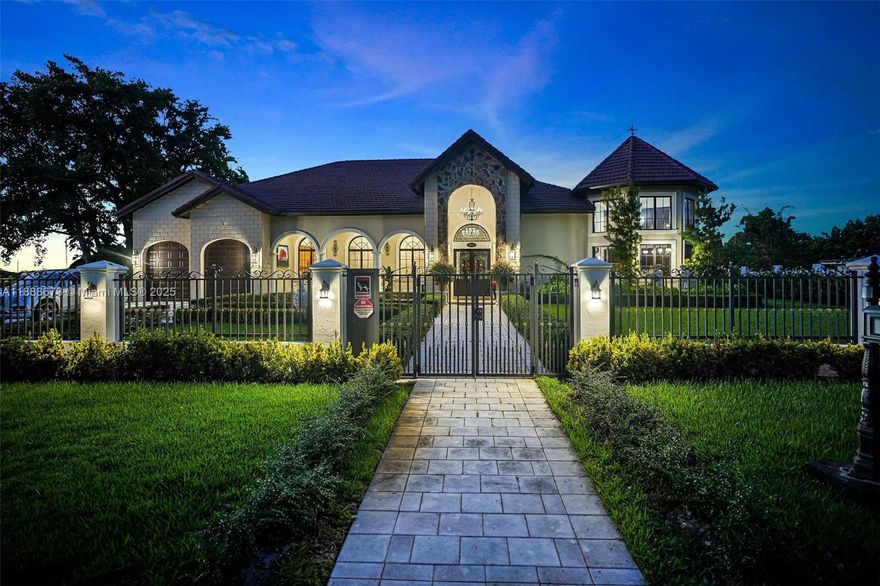 This Stunning Estate features 7 bedrooms and 5/2 bathrooms within 6,045 square feet of living space on a 40,423 square foot lot. The grand foyer leads to a living area with a 22-foot ceiling, perfect for families. Highlights include a private master wing, an entertainment area with a built-in bar, and an expansive outdoor space with a covered patio, grill, and chef's kitchen with a Viking gas range and  Eat-in island, and butler's pantry   The office connects to both the master suite and the outdoor area with a coved patio grill, pizza oven, fire pit, and pool. Additionally, there’s a two-car garage with a laundry room and a guest cottage with 1 bedroom and 1 bathroom, all located on Killiam Drive, minutes from Pinecrest.  Great entertainment home and spacious for a "Royalty lifestyle"