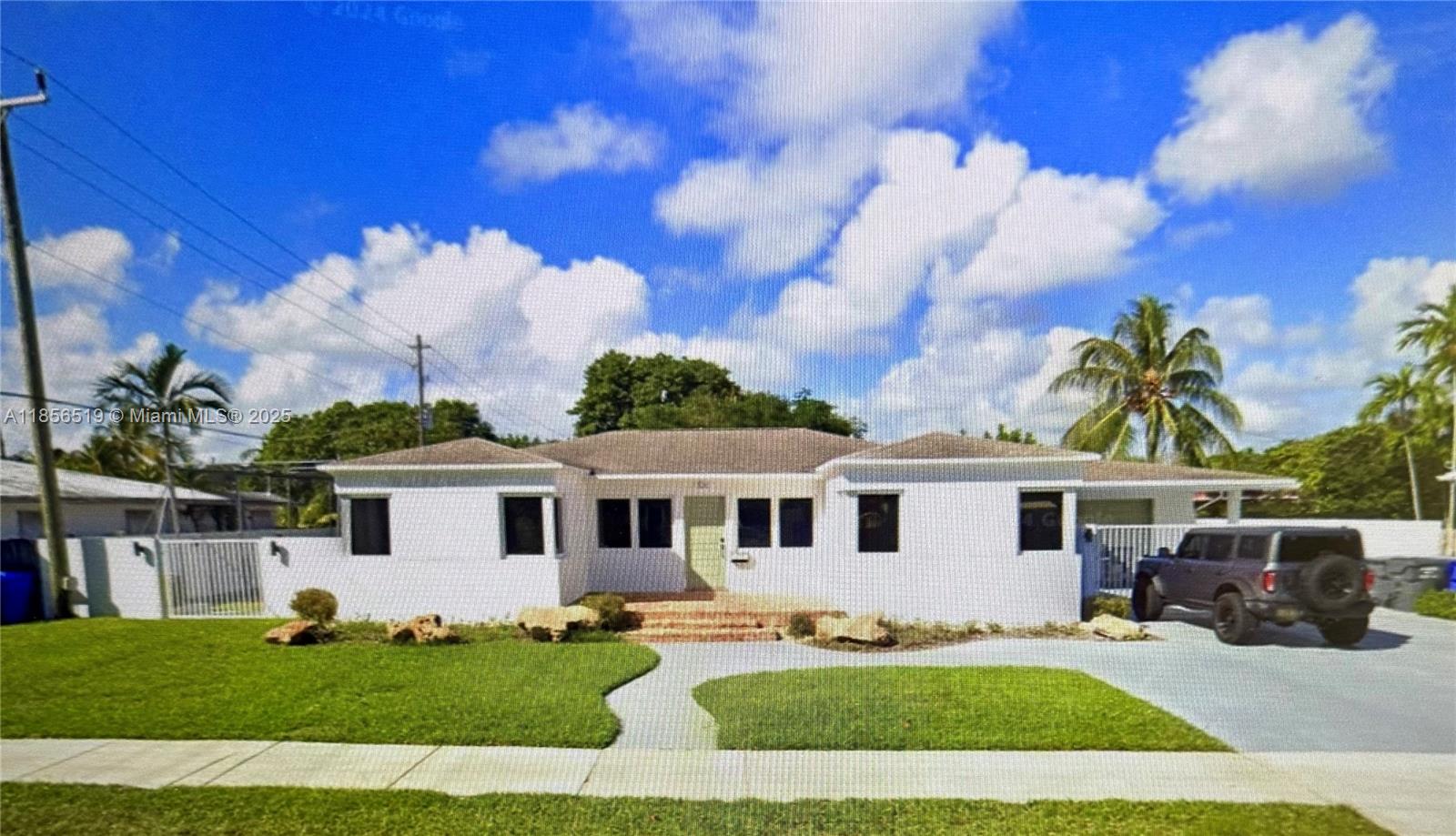 Just WOW!! Remodeled home,gorgeous wood floors, split bedrooms (large), open concept for ease of entertaining and living! ALL windows and doors-HURRICANE IMPACT GLASS! See all photos! So many extras... remote control. window treatments, tinted windows. The most GORGEOUS POOL, large yard for entertaining! Completely fenced with privacy wall! Double garage used as work shop + carport. Roof only 10 yrs old. Electronic fence and gate to property in front. Natural gas on street offers possibilities-gas hot water tank, gas cooktop on stove, elect. oven, see photos! House is fantastic! 3 blks N. of Hollywood Cir! Ready for families, entertaining, and close to parks, schools, beach, fresh markets, and shopping! OK to rent, no HOA. Walkable neighborhood. CALL Listing agent to show, owner occupied.
