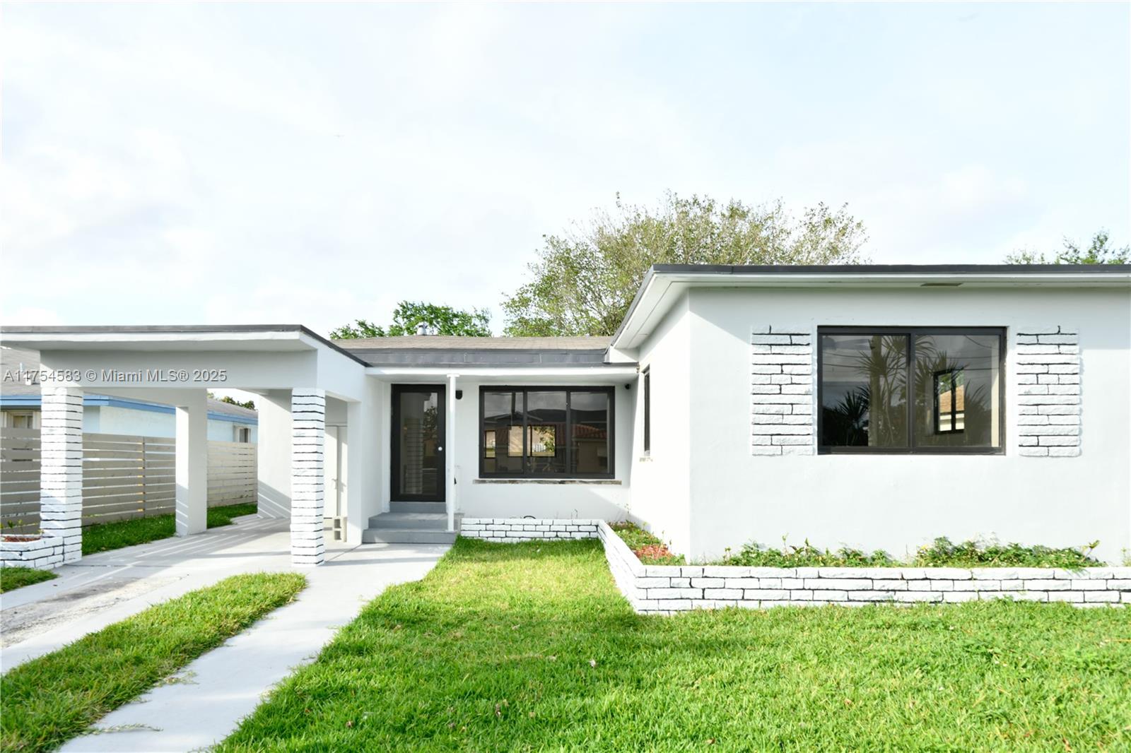 Welcome to this beautifully renovated 3-bed, 2-bath home near Liberty Square Apartments. This inviting residence offers modern comfort and classic charm. Conveniently located just 15 minutes from Wynwood, Downtown Miami, and Little Havana and a mere 5 minutes from Miami International Airport, this home provides unparalleled convenience and accessibility. The home features impact windows and doors, enhancing safety and energy efficiency. The spacious living area seamlessly flows into a stylish dining space, and the well-appointed kitchen features sleek countertops and contemporary appliances. The generous bedrooms and renovated bathrooms provide a touch of luxury. The property boasts a garden and a patio ideal for outdoor gatherings.