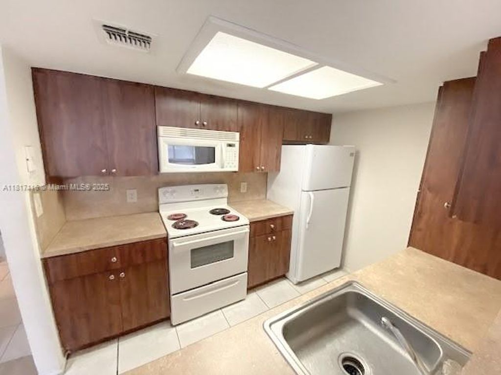 Photo of 8423 coral Lake #8423, Coral Springs, FL 33065 (MLS # A11817116)