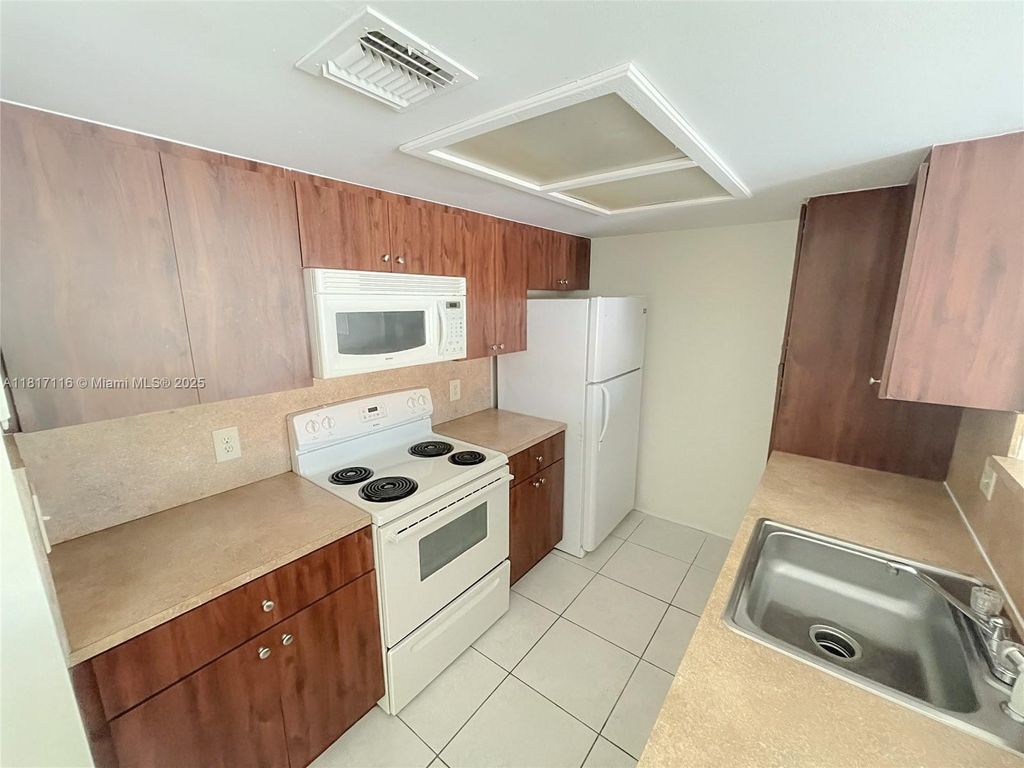 Photo of 8423 coral Lake #8423, Coral Springs, FL 33065 (MLS # A11817116)