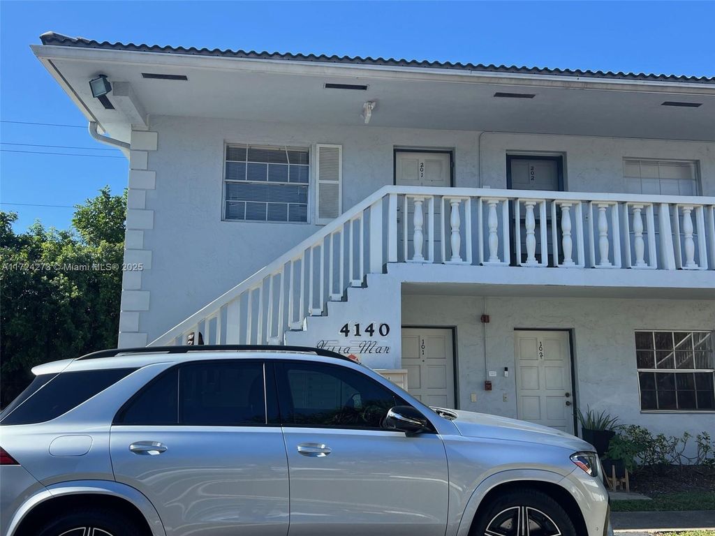 Photo of 4140 Woodside Dr #101, Coral Springs, FL 33065 (MLS # A11724273)